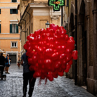 Buy canvas prints of Men With Red Balloons On Cobblestone Street by Artur Bogacki