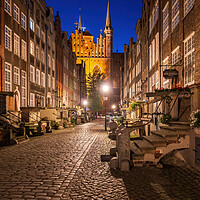 Buy canvas prints of Mariacka Street At Night In Old Town Of Gdansk by Artur Bogacki