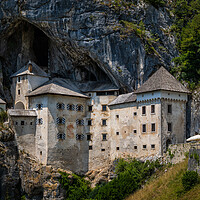 Buy canvas prints of The Predjama Cave Castle In Slovenia by Artur Bogacki