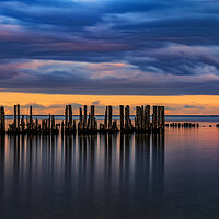 Buy canvas prints of Old Sea Pier Wooden Posts At Twilight by Artur Bogacki