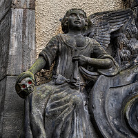 Buy canvas prints of Angel With Skull In Greyfriars Kirkyard In Edinburgh by Artur Bogacki