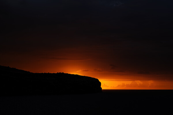 Sunrise Through The Darkness On Malta Island Picture Board by Artur Bogacki