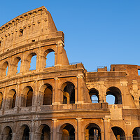 Buy canvas prints of Ancient Colosseum In Rome At Sunset by Artur Bogacki