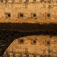 Buy canvas prints of Belem Tower Wall With Reflection In Water by Artur Bogacki