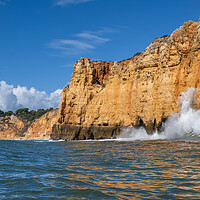 Buy canvas prints of Ocean Waves Crashing Against Cliff In Algarve, Portugal by Artur Bogacki