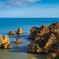Buy canvas prints of Picturesque Algarve Coastline At Sunset In Portugal by Artur Bogacki