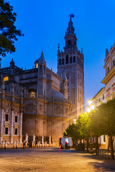 Seville Cathedral And Giralda Tower At Night Picture Board by Artur Bogacki