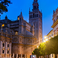 Buy canvas prints of Seville Cathedral And Giralda Tower At Night by Artur Bogacki