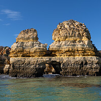 Buy canvas prints of Kissing Couple Rock Ocean View in Algarve, Portugal by Artur Bogacki