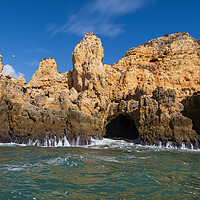 Buy canvas prints of Algarve Coastline With Cave From The Atlantic Ocean by Artur Bogacki