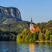 Buy canvas prints of Sunrise At Lake Bled In Slovenia by Artur Bogacki
