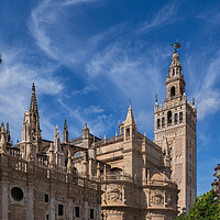 Buy canvas prints of Seville Cathedral And Giralda Bell Tower by Artur Bogacki