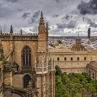 Buy canvas prints of Seville Cathedral With Garden Of Orange Trees by Artur Bogacki