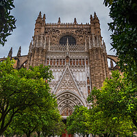 Buy canvas prints of Seville Cathedral From Orange Trees Courtyard by Artur Bogacki