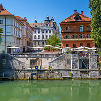 Buy canvas prints of Ljubljana City At Novi Trg From Ljubljanica River by Artur Bogacki