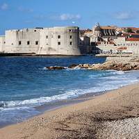 Buy canvas prints of Dubrovnik Beach and Old City by Artur Bogacki