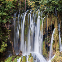 Buy canvas prints of Waterfall in Autumn Forest by Artur Bogacki