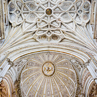 Buy canvas prints of Mezquita Cathedral Ceilings in Cordoba by Artur Bogacki