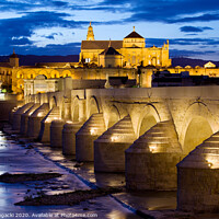 Buy canvas prints of Cathedral Mosque and Roman Bridge in Cordoba by Artur Bogacki