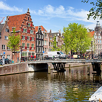 Buy canvas prints of Amsterdam Canal, Bridge and Houses by Artur Bogacki
