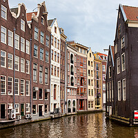 Buy canvas prints of Amsterdam Canal Houses by Artur Bogacki