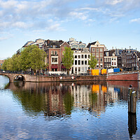 Buy canvas prints of Amstel River in the City of Amsterdam by Artur Bogacki