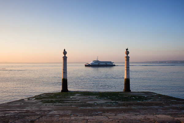 Columns Pier and Tagus River at Sunrise in Lisbon Picture Board by Artur Bogacki