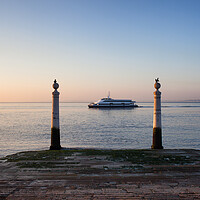 Buy canvas prints of Columns Pier and Tagus River at Sunrise in Lisbon by Artur Bogacki
