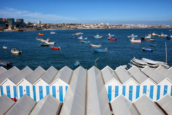 Sheds and Boats Moored at Bay in Cascais Picture Board by Artur Bogacki