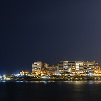 Buy canvas prints of Sliema Town Skyline At Night In Malta by Artur Bogacki