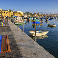 Buy canvas prints of Marsaxlokk Fishing Village in Malta by Artur Bogacki