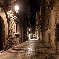 Buy canvas prints of Street in Gothic Quarter of Barcelona at Night by Artur Bogacki