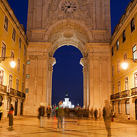 Buy canvas prints of Rua Augusta Arch at Night in Lisbon by Artur Bogacki