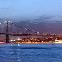 Buy canvas prints of 25th of April Bridge at Night in Lisbon by Artur Bogacki