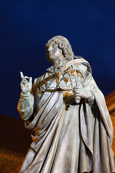 Nicolaus Copernicus Monument at Night in Torun Picture Board by Artur Bogacki