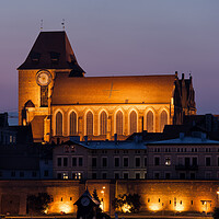 Buy canvas prints of Torun Cathedral at Night in Poland by Artur Bogacki