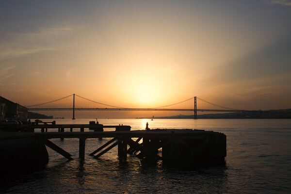 Sunset at Almada Quay and 25 de Abril Bridge in Lisbon Picture Board by Artur Bogacki