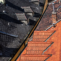 Buy canvas prints of Red And Black Tile House Roof by Artur Bogacki