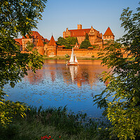 Buy canvas prints of Malbork Castle at Sunset in Poland by Artur Bogacki