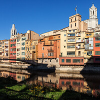 Buy canvas prints of Old Town of Girona Waterfront Houses by Artur Bogacki