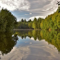 Buy canvas prints of  Reflections in Three Island Lake by Kerry Palmer