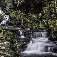 Buy canvas prints of  Lumsdale Valley Waterfall by Martin Smith