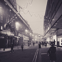 Buy canvas prints of Bank Hey Street, Blackpool, at night in the mist by David Graham