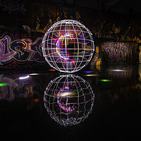 Buy canvas prints of Orb Reflections by Jason Tait