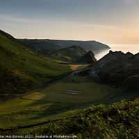 Buy canvas prints of Low sun over The Valley of Rocks, Lynton.  by Daryl Peter Hutchinson