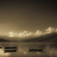 Buy canvas prints of Fewa Lake and boats in sepia, Pokhara, Nepal by Julian Bound