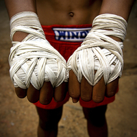 Buy canvas prints of  Thai boxer, Thailand by Julian Bound