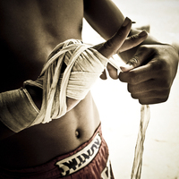Buy canvas prints of   Thai boxer, Thailand by Julian Bound