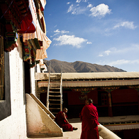 Buy canvas prints of Two old Buddhist monks of Drepung Monastery, Tibet by Julian Bound