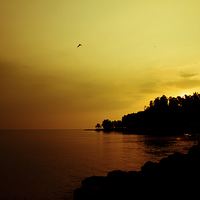 Buy canvas prints of  Sunset in Carlita, Indonesia by Julian Bound